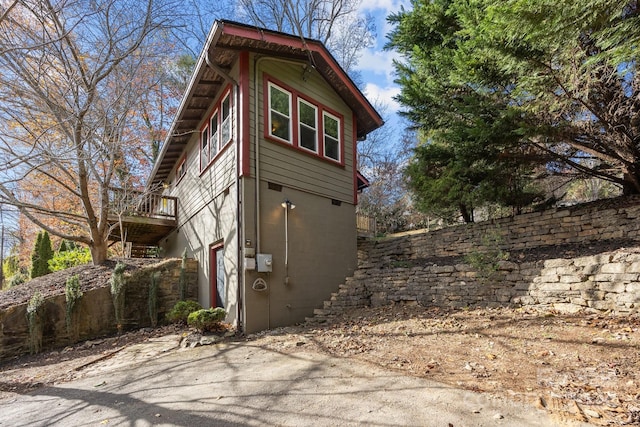 view of property exterior with a garage