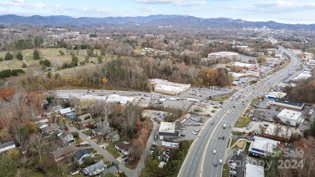 drone / aerial view featuring a mountain view