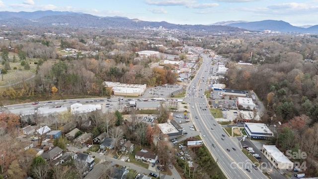 drone / aerial view featuring a mountain view