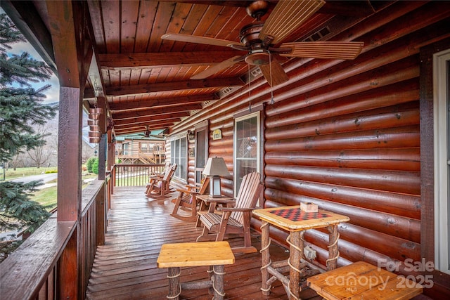 deck featuring ceiling fan and covered porch