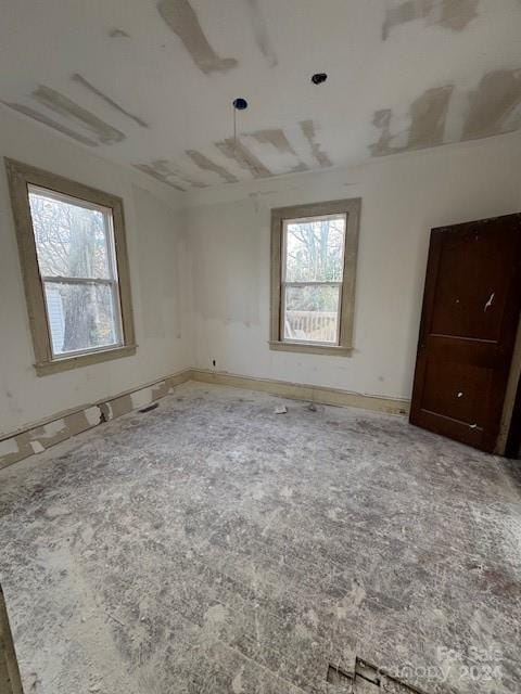 unfurnished bedroom featuring carpet flooring