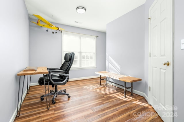 office space featuring hardwood / wood-style floors