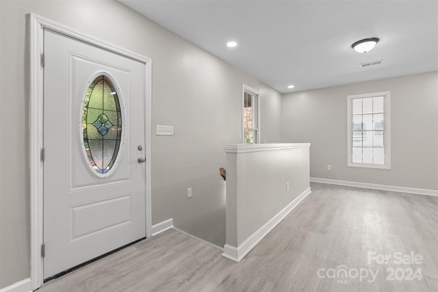 entrance foyer featuring light hardwood / wood-style floors