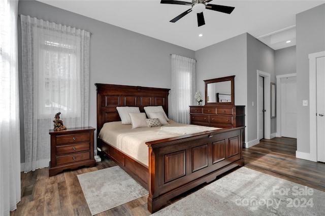 bedroom featuring dark hardwood / wood-style floors and ceiling fan