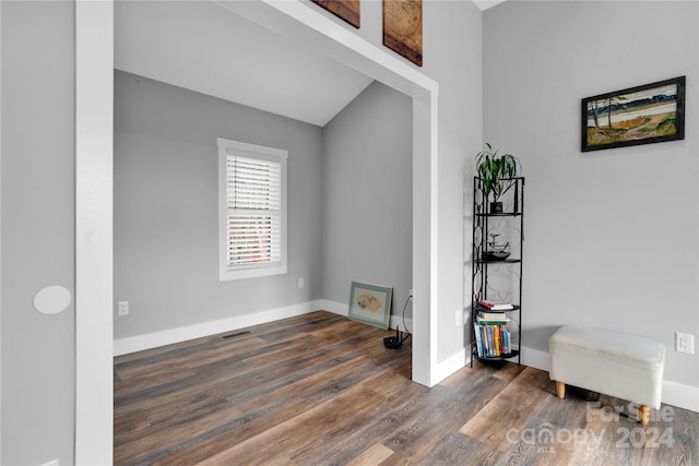 spare room with dark hardwood / wood-style flooring