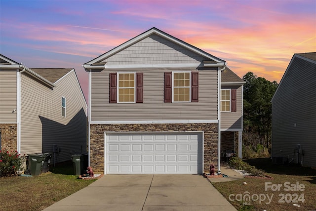 view of front of property with a garage