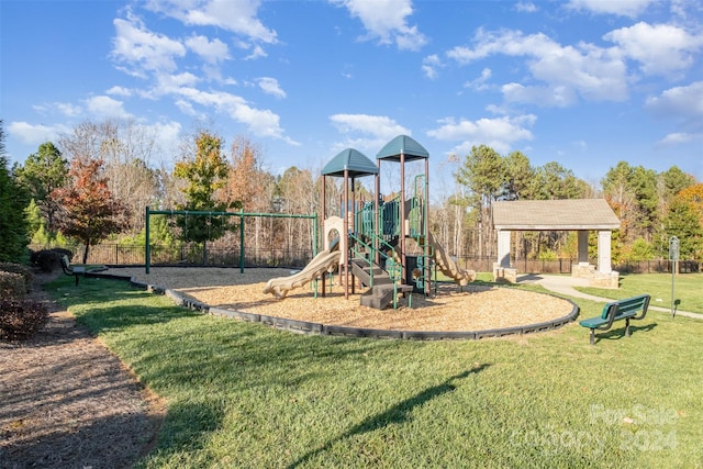 view of jungle gym with a yard