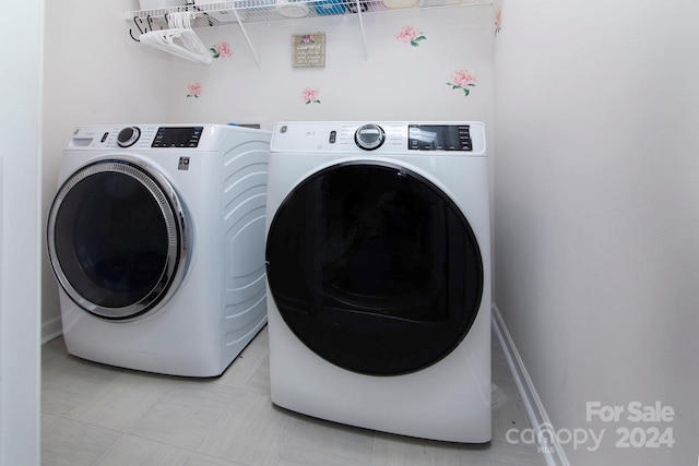 laundry area featuring separate washer and dryer