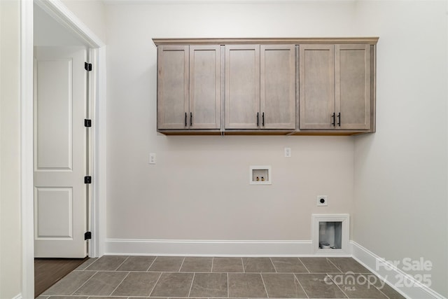 laundry room with washer hookup, cabinet space, hookup for an electric dryer, and baseboards