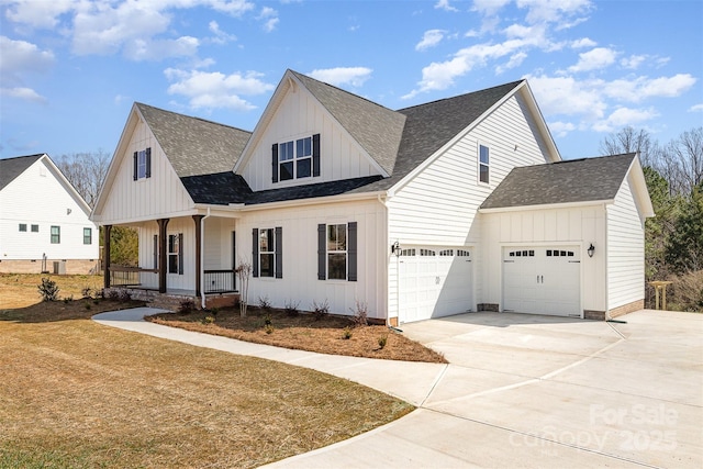 modern farmhouse style home featuring a porch, concrete driveway, a shingled roof, and board and batten siding