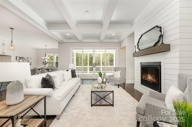 living area featuring a fireplace, recessed lighting, wood finished floors, coffered ceiling, and beamed ceiling