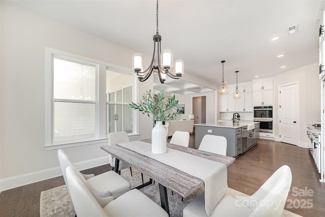 dining area featuring visible vents, baseboards, dark wood-style floors, a notable chandelier, and recessed lighting