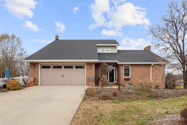 front of property with a garage