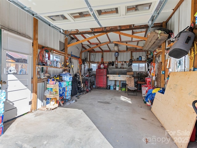 garage with a workshop area