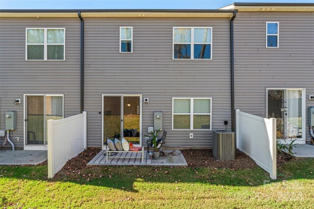 9232 Widden Way, Charlotte, NC 28269 - rear view of house featuring a patio and central air condition unit