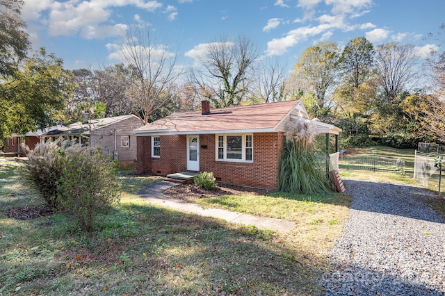 view of front of property with a front lawn