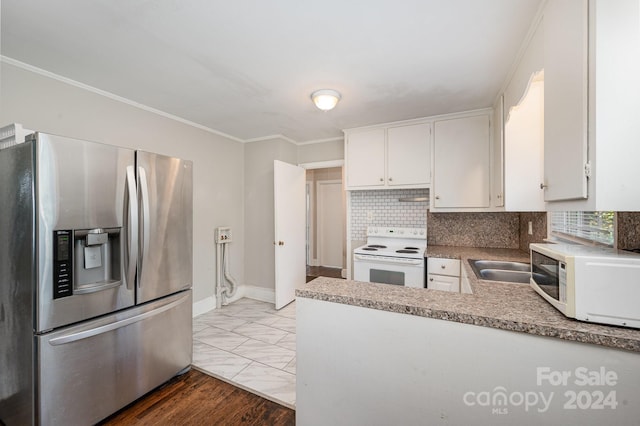 kitchen featuring white appliances, crown molding, tasteful backsplash, light hardwood / wood-style floors, and white cabinetry