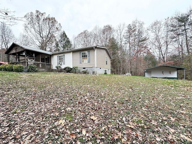 view of property exterior featuring a carport