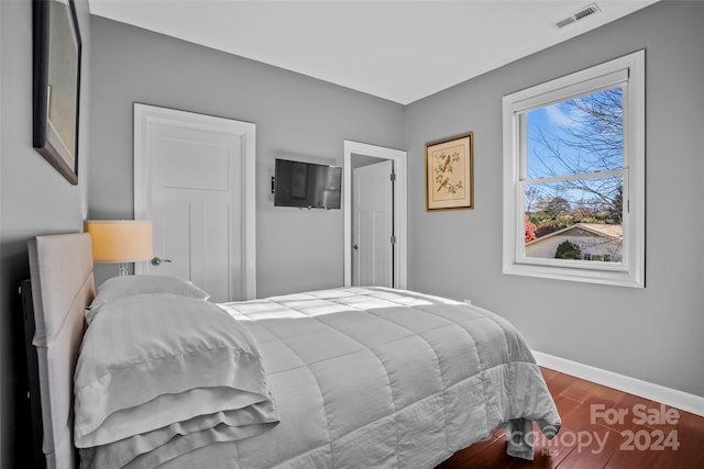 bedroom featuring wood-type flooring