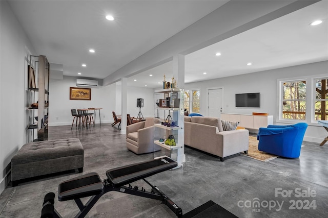 living room featuring a wall mounted AC