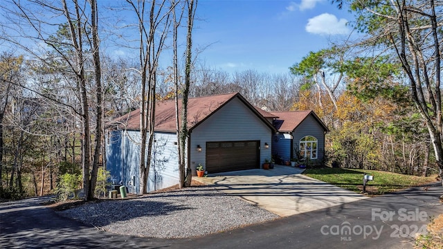 view of front of home with a garage