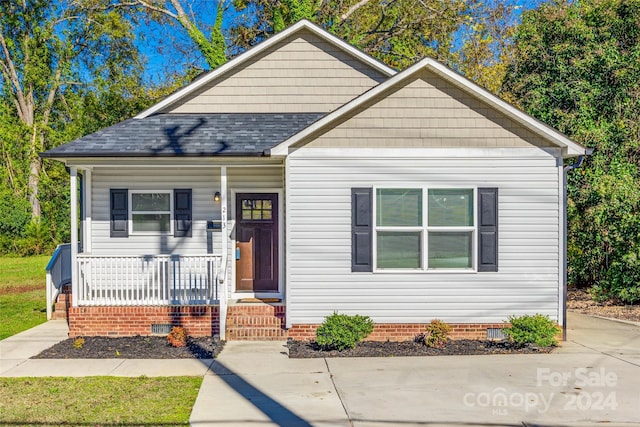 bungalow-style house featuring covered porch