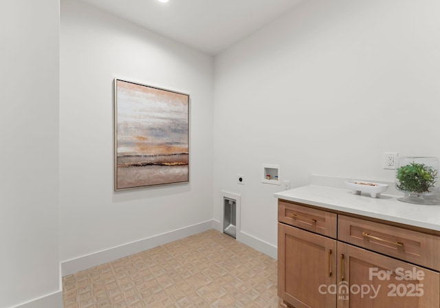 laundry area with electric dryer hookup, cabinets, and hookup for a washing machine