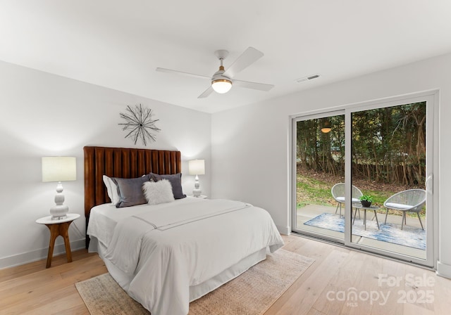 bedroom featuring access to outside, ceiling fan, and light wood-type flooring