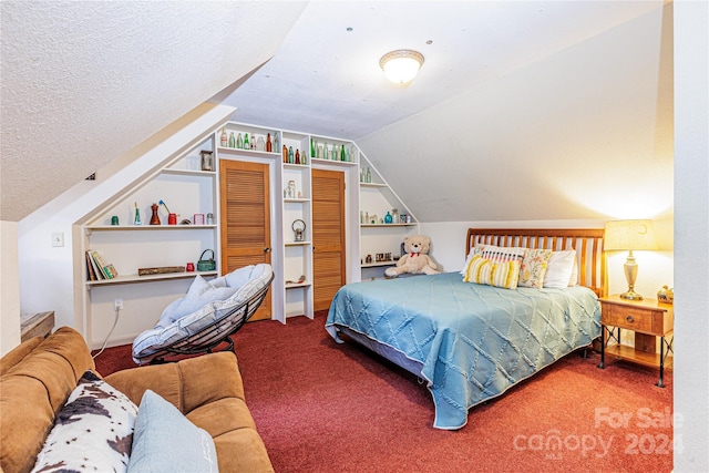 carpeted bedroom with lofted ceiling and a textured ceiling