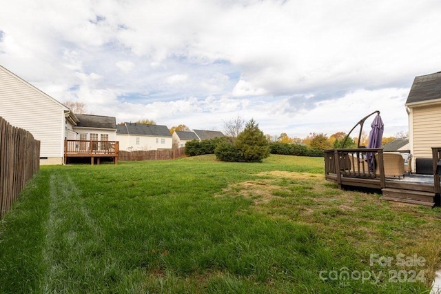 view of yard with a deck