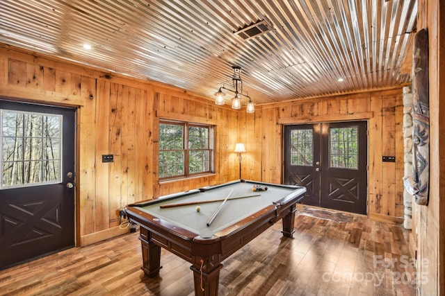 recreation room featuring billiards, hardwood / wood-style floors, wooden ceiling, and french doors