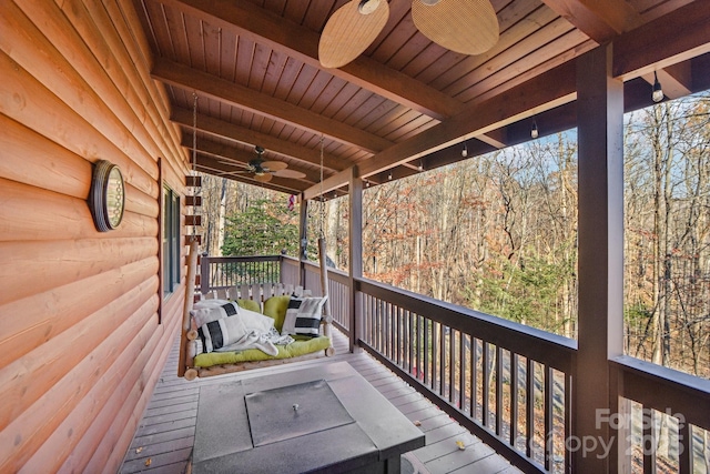 wooden deck with ceiling fan