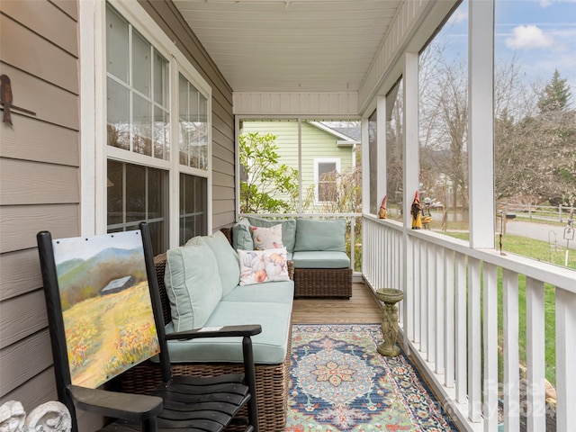 sunroom / solarium featuring a healthy amount of sunlight