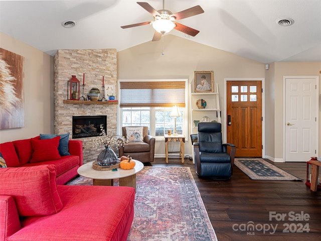 living room with a fireplace, hardwood / wood-style flooring, ceiling fan, and lofted ceiling