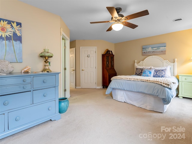 carpeted bedroom with ceiling fan