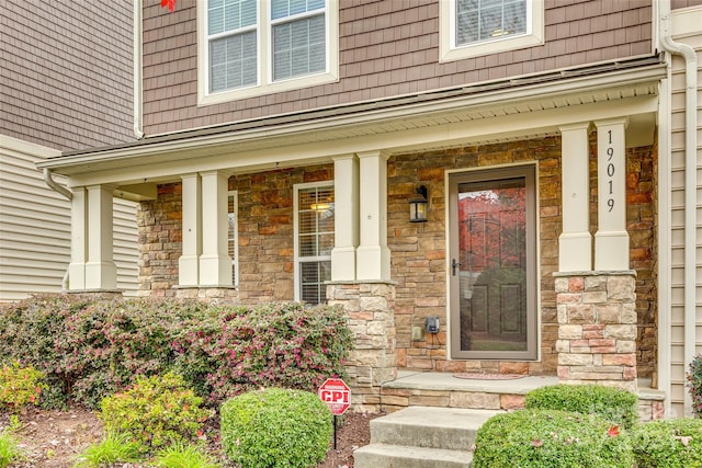 entrance to property with a porch