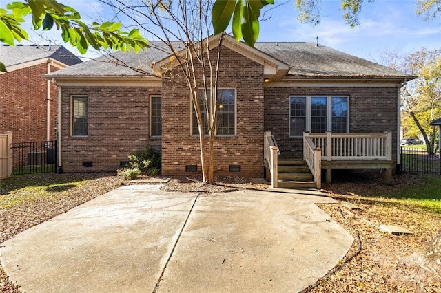 rear view of property with a patio area