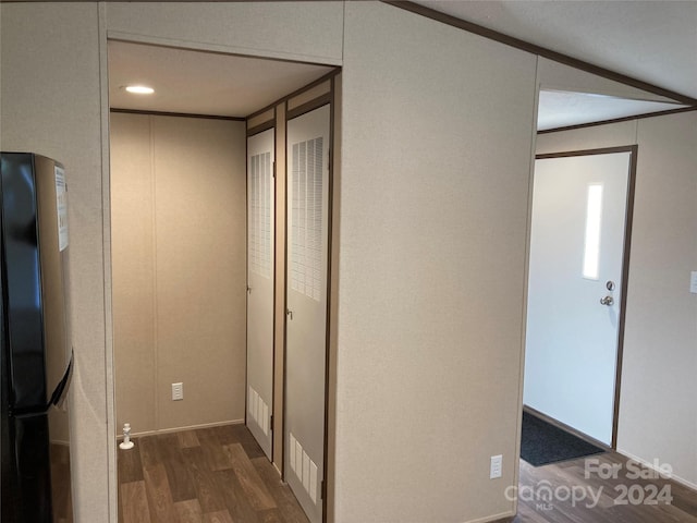 corridor with dark wood-type flooring