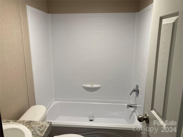 full bathroom with shower / bathing tub combination, vanity, and toilet