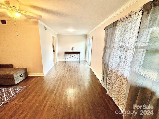 hallway featuring hardwood / wood-style flooring, crown molding, and a textured ceiling