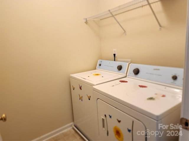 laundry room with separate washer and dryer