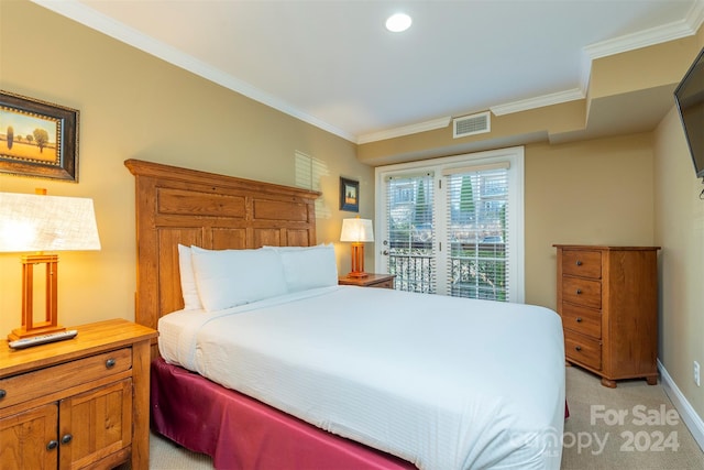 carpeted bedroom with crown molding