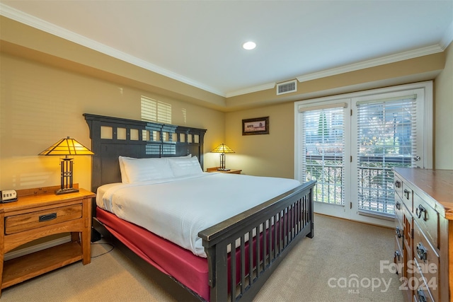 bedroom featuring light colored carpet, crown molding, and access to outside