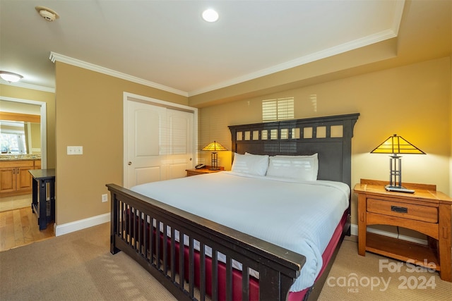 bedroom with hardwood / wood-style floors and ornamental molding