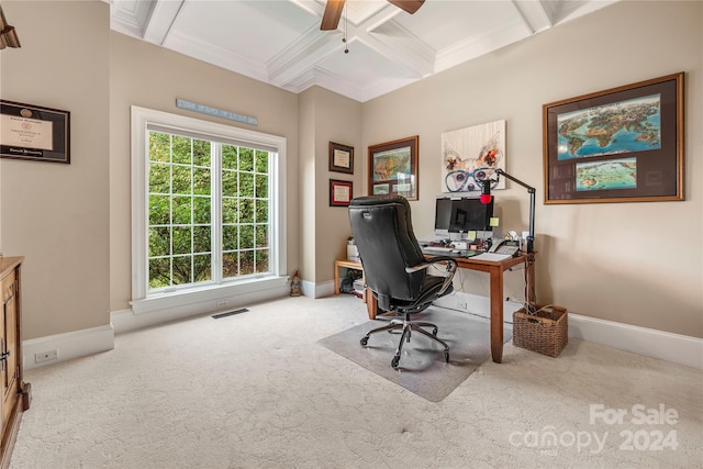 carpeted home office featuring beam ceiling, crown molding, ceiling fan, and coffered ceiling