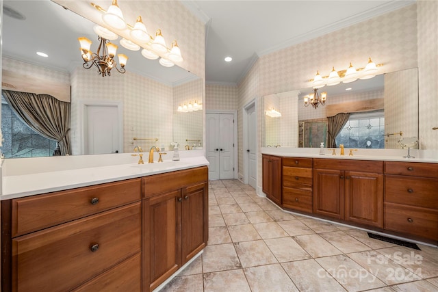 bathroom featuring tile patterned floors, vanity, ornamental molding, and an inviting chandelier