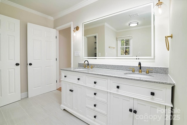 bathroom featuring vanity, tile patterned flooring, and crown molding