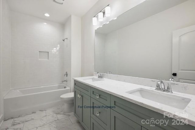 full bathroom with vanity, toilet, and tiled shower / bath