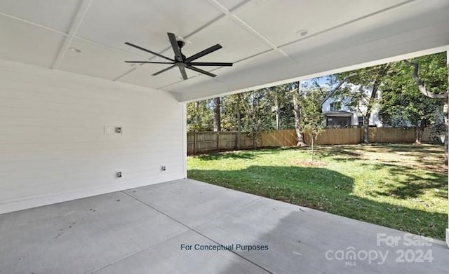 view of yard featuring ceiling fan and a patio area