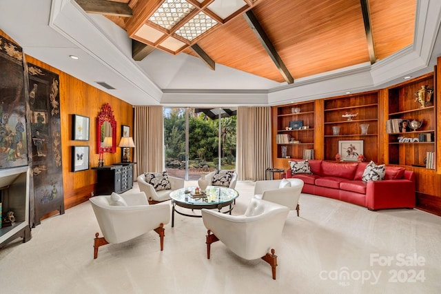 living room featuring light colored carpet, wooden ceiling, and wooden walls